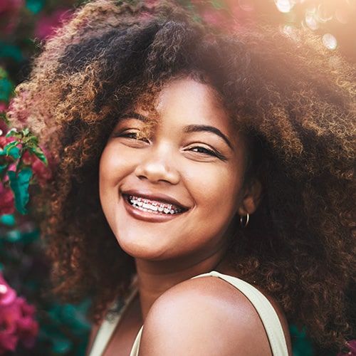 Teen smiling with braces
