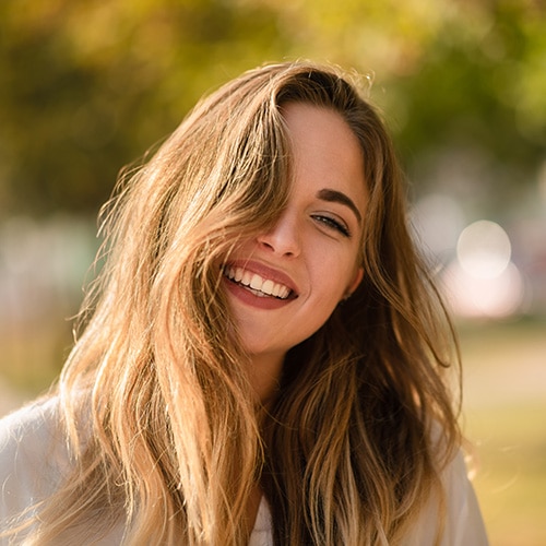 Woman smiling into the camera